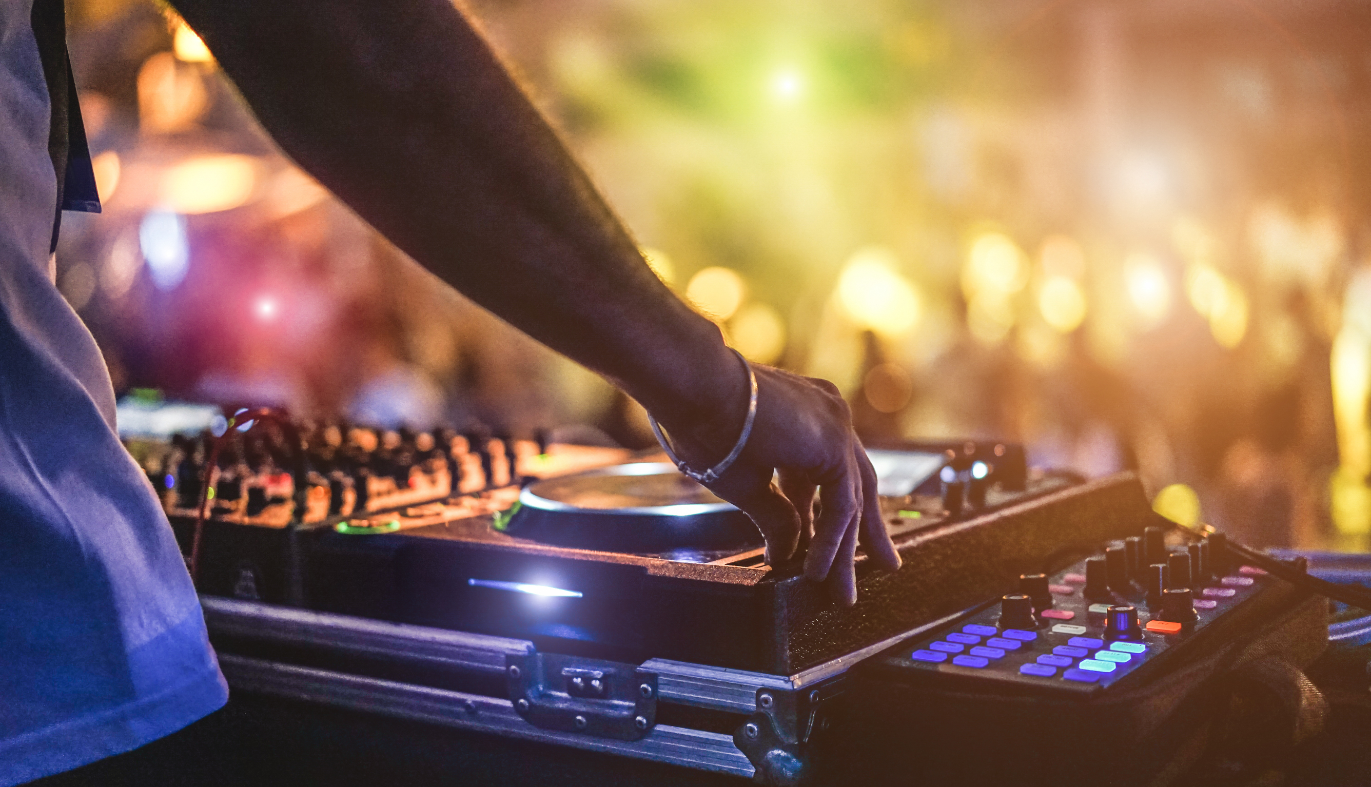 Dj Mixing Outdoors At Party